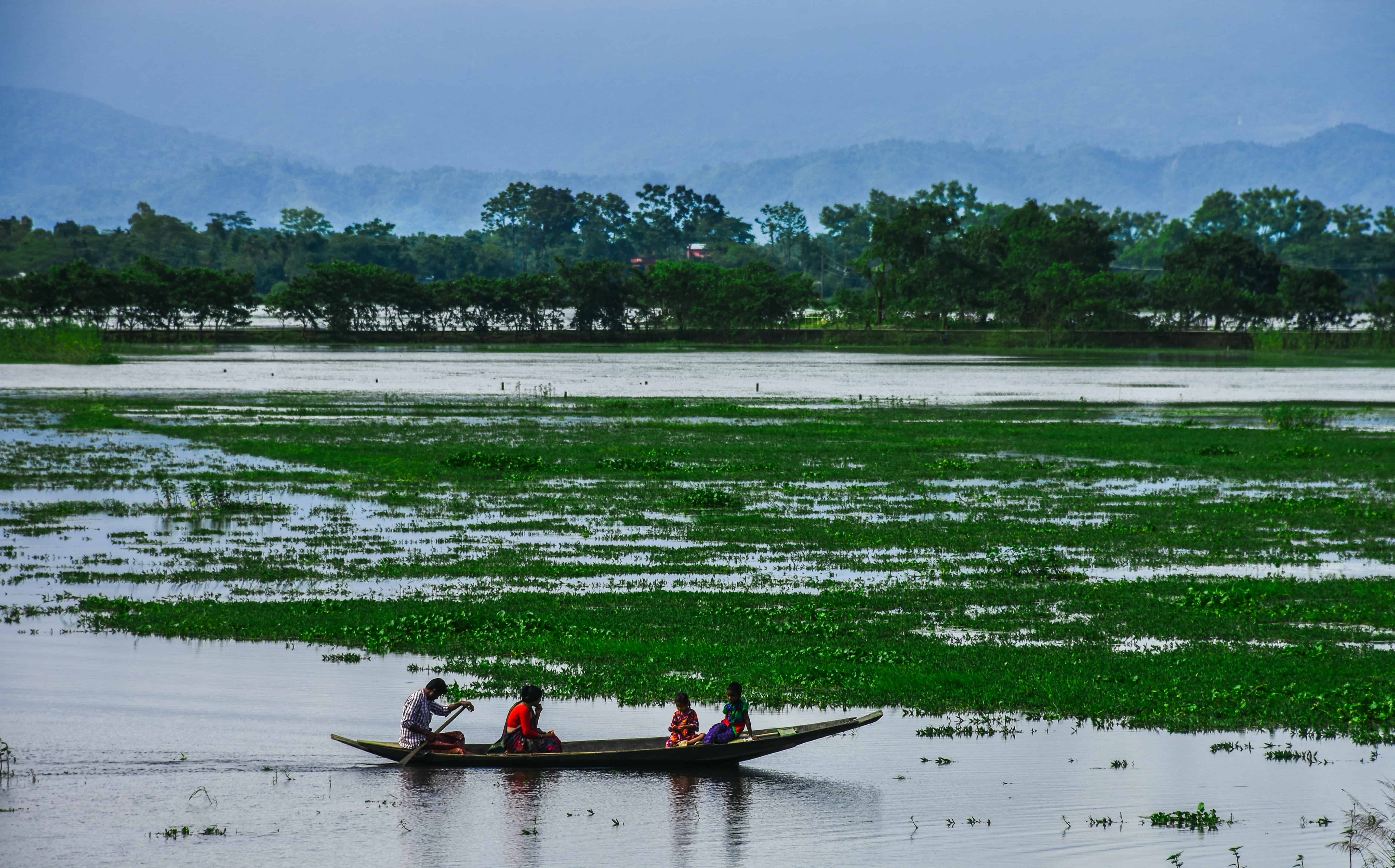 Family in boat Photography by Ajmain Fayek